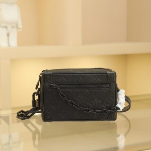 18.5 x 13.0 x 8.0 cm (L x H x W) • Taurillon calf leather • Fabric lining • Calf leather trim • Matte metal hardware • Exterior zippered pocket • Interior patch pocket • Shoulder strap: Non-removable, adjustable • Strap length: 42.0 cm • Adjustable to: 58.0 cm